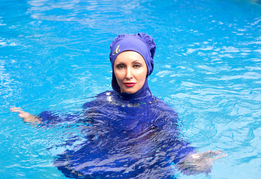 Muslim Women swimming in pool 