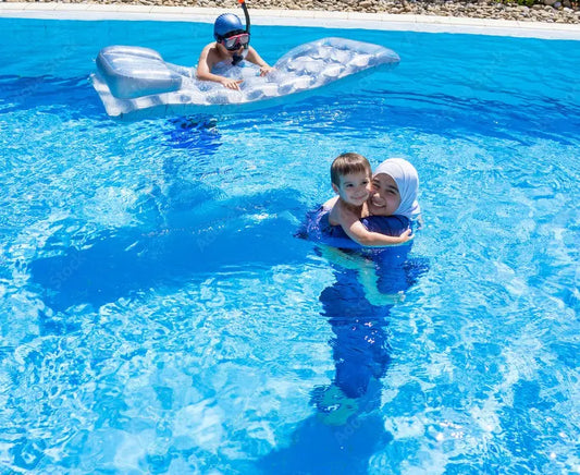 modest swimwear mom with her kids