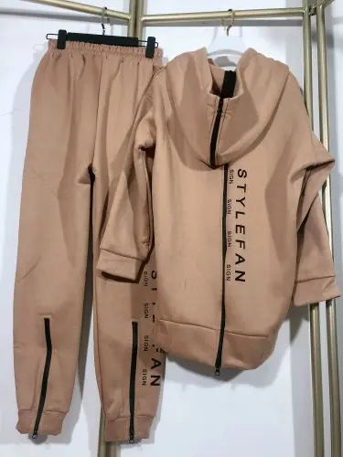Beige tracksuit with on a white background