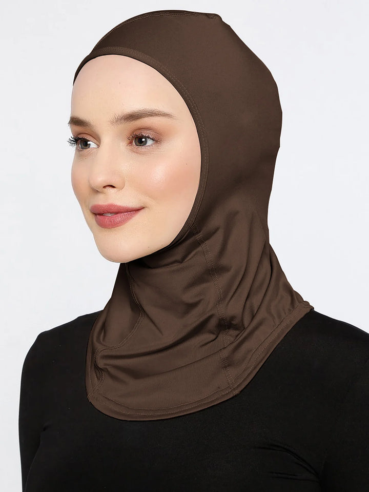 Close-up of stretchable hem on athletic brown active hijab