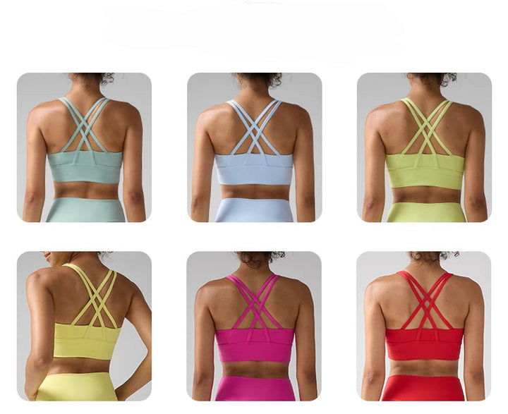 Display of color options for a sports bra with criss-cross back design.