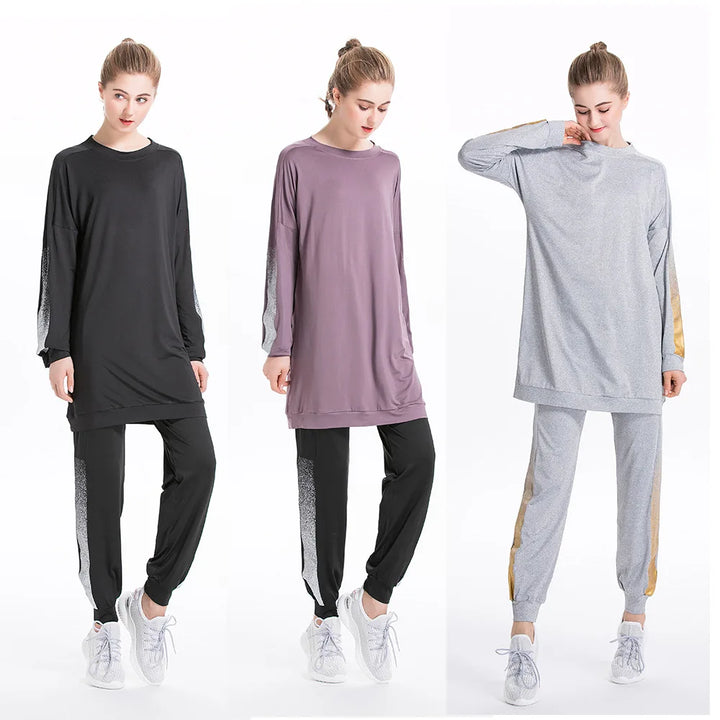 Flat lay of 2-piece sportswear suit in purple – tunic and leggings set