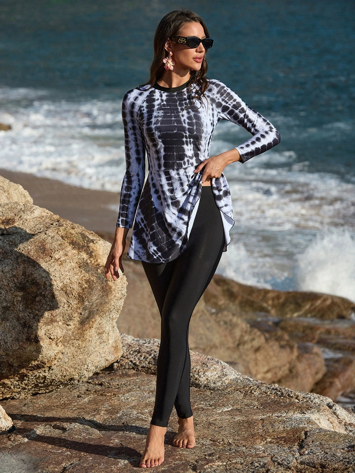 Gray tie-dye burkini dress paired with classic black swim pants