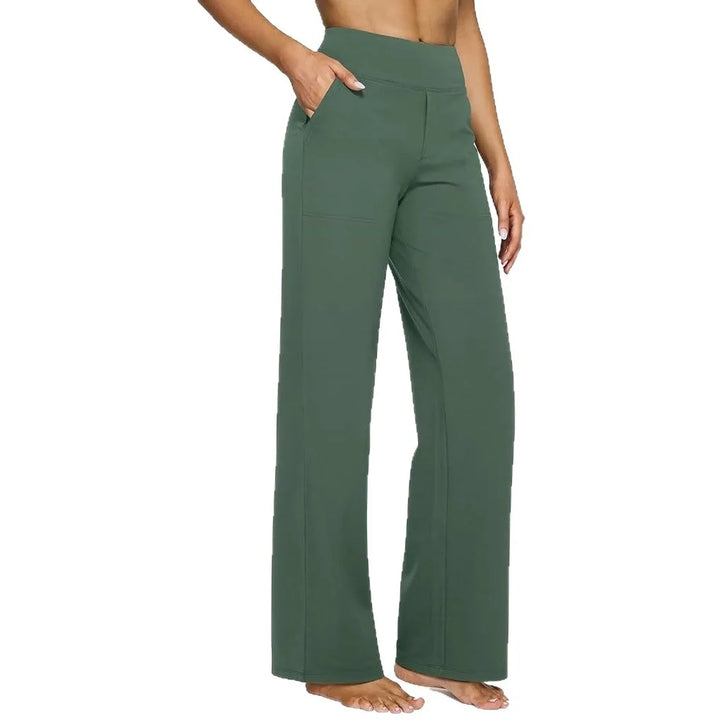 Green pants worn by a person on a white background