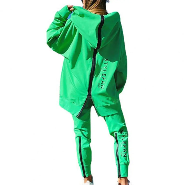 Green tracksuit with brand logo on a white background