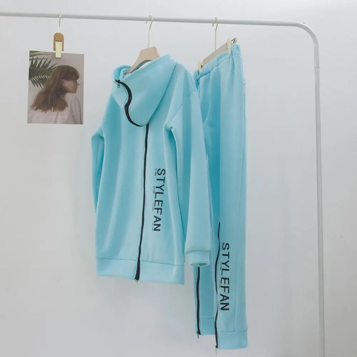 Light blue hoodie and pants set with 'STYLEFAN' branding on a white background