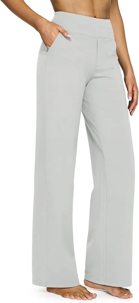 Light gray wide-leg pants worn by a person on a white background