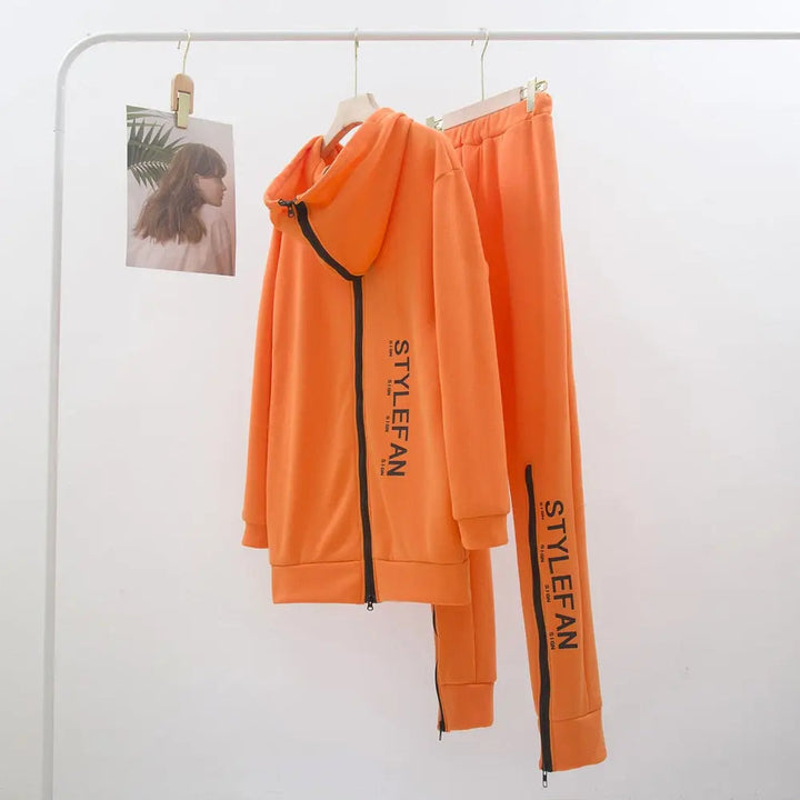 Orange tracksuit with 'STYLEFAN' branding on a white background