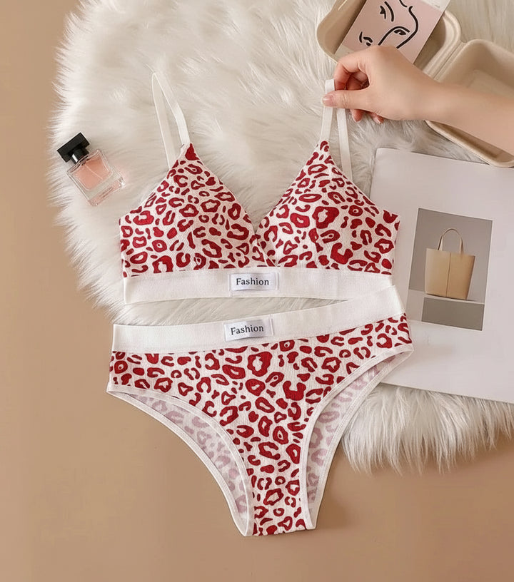 Model adjusting shoulder strap of seamless leopard bra