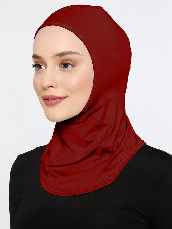 Model wearing active hijab under a hijab wrap