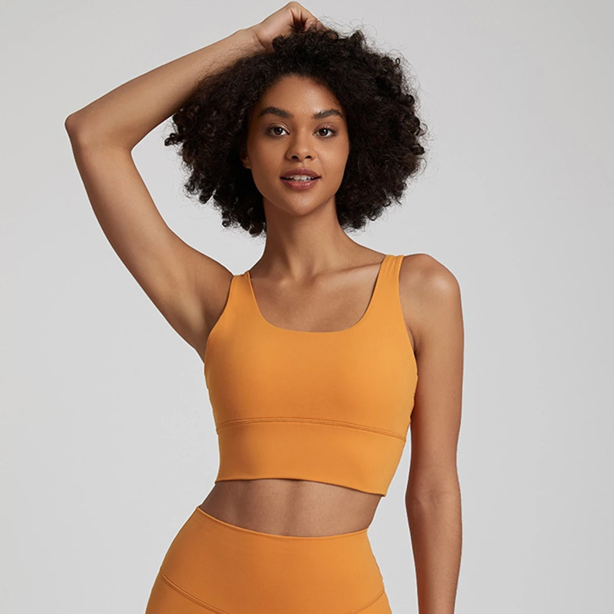 orange sports bra and leggings set