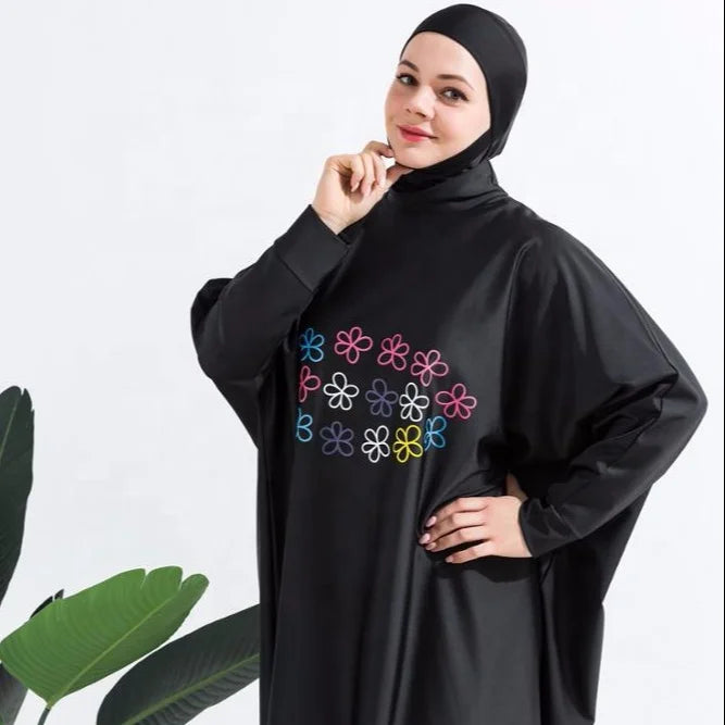 cute muslim girl wearing black burkini