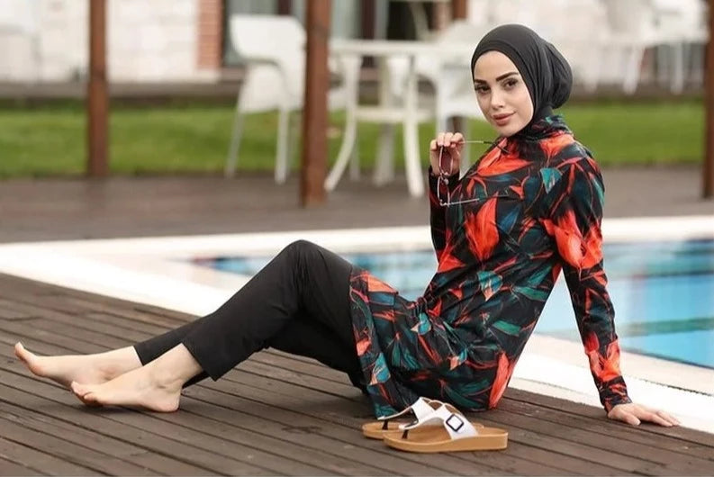 muslim girl wearing modest swimwear by pool