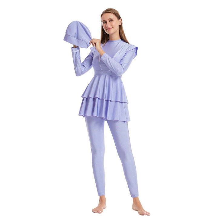 Side view of long sleeve swimsuit showing flattering fit and peasant sleeve cut