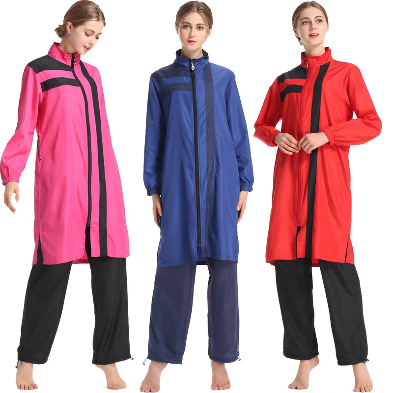 Three-piece covered swimwear set including hijab, long-sleeve top, and full-length pants."