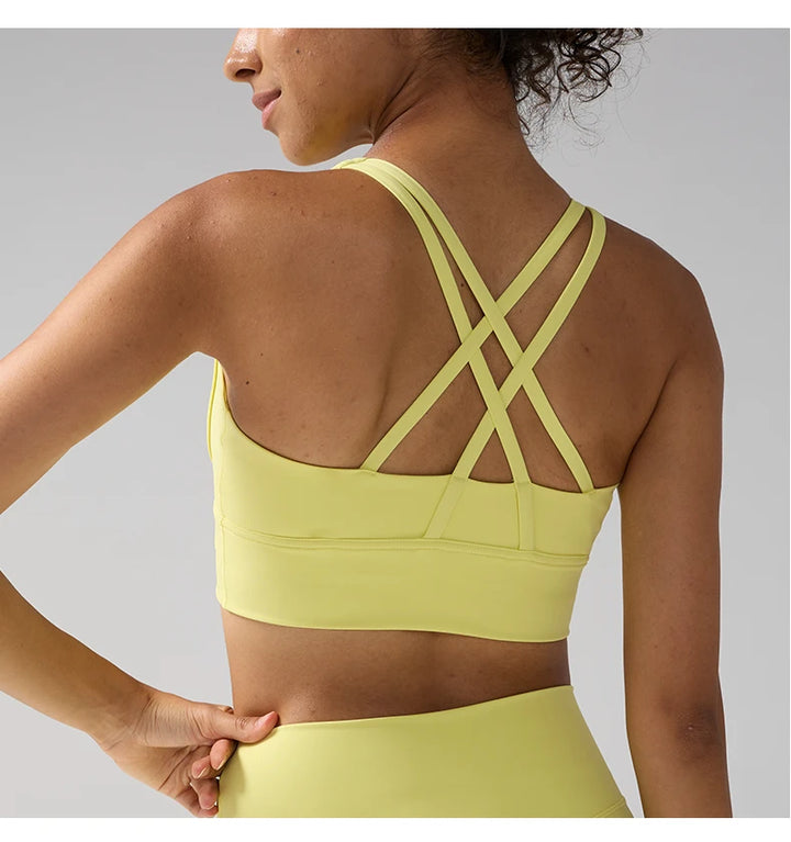 Yellow sports bra with criss-cross back design 