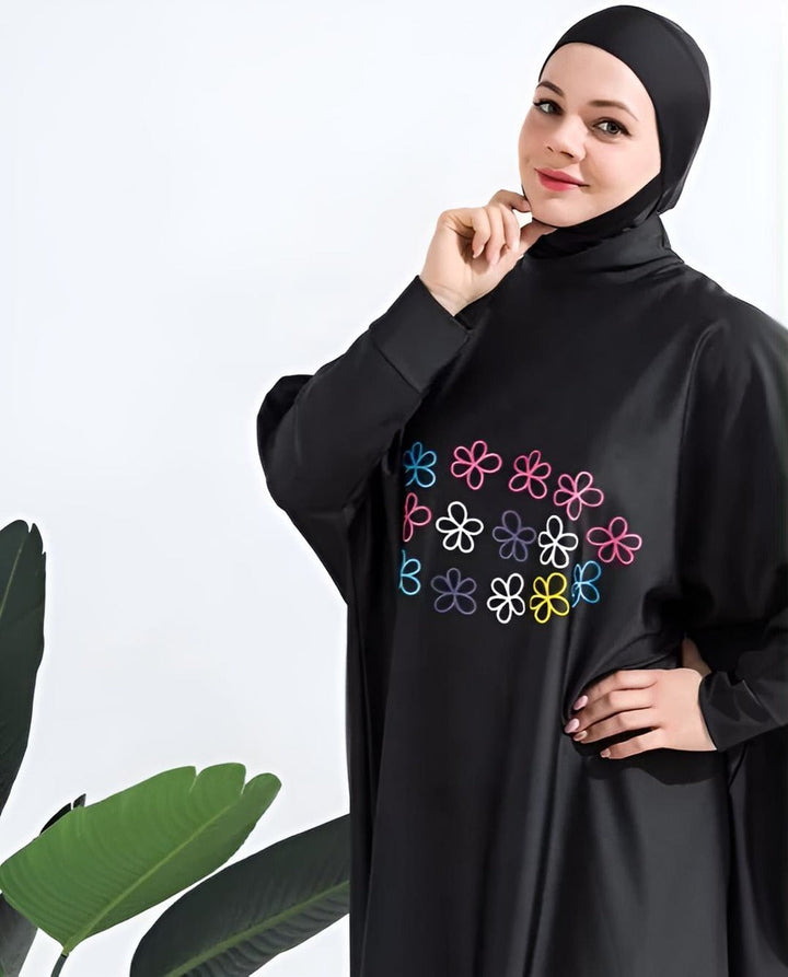 cute muslim girl wearing black burkini