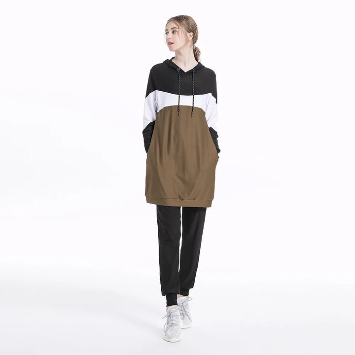 women wearing modest activewear wearing a black, white,