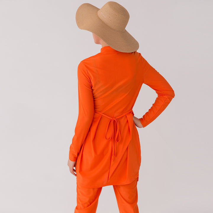 Back view of modest burkini with flowing tunic design